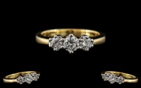 18ct Gold - Superb Quality Ladies 3 Stone Diamond Set Ring. Full Hallmark for 18ct - 750.
