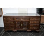 A Large And Impressive Chinese Carved Hardwood Sideboard,