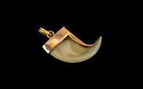 9ct Gold Antique Pendant, Suspended with Antique Tooth / Claw. Fully Hallmarked for Gold.