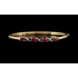 Ladies 9ct Gold Attractive Ruby and Diamond Set Hinged Bangle. Fully Hallmarked for 9ct.