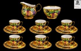 A Royal Worcester Style Part Teaset comprising of 6 large cups and saucers and sideplates,