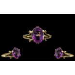9ct Gold - Attractive Single Stone Amethyst Set Ring, Good Setting and Design. Ring Size M - N.