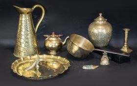 A Collection of Assorted Brass Ware to include pitcher, pan, candlesticks,