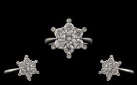 18ct White Gold Superb Quality and Attractive Starburst Diamond Set Ring. The Round Modern Brilliant