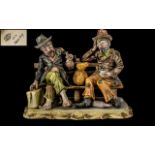 Capodimonte Group of Two Tramps - Drinking Sitting on a Bench.