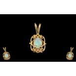 14ct Gold Opal Set Pendant. Lovely Design and Opal of Good Colour.