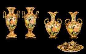 A Collection of Royal Worcester Style Pottery to include two pairs of Urns/Vases.