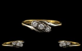 18ct Gold and Platinum 3 Stone Diamond Set Ring. The Round Cut Diamonds of Good Colour and Clarity.
