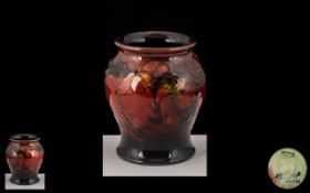 William Moorcroft Signed Small Flambe 'Leaf and Berry' Vase of bulbous form,