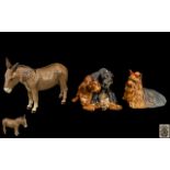 Beswick Hand Painted Dog Figures. Comprises 1/ Yorkshire Terrier, Model Num 1944. Designer A.