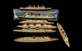 A Collection of Seven Diecast Models mostly ocean liners.