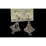 A Pair of Antique Style Sapphire and Drop Earrings central sapphire surrounded by small round cut