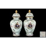 Pair of Modern Decorated Lidded Vases Painted to the Body with Garlands of Flowers with a Gilded