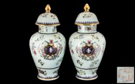 Pair of Modern Decorated Lidded Vases Painted to the Body with Garlands of Flowers with a Gilded