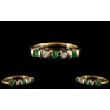Ladies Contemporary and Attractive 9ct Yellow Gold, Diamond and Emerald Set Ring.