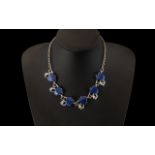 Lisner Elaborate Vintage Design Necklace in blue lucite shapes, set into shaped silver plated
