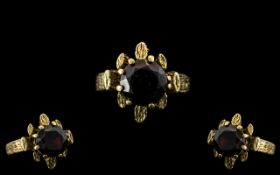 9ct Gold Garnet Set Dress Ring. Good Quality and Design. Fully Hallmarked for Gold.