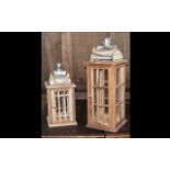 A Pair of Reproduction Teak Storm Lanterns with Lattice front cemented with metal tin canopy top.