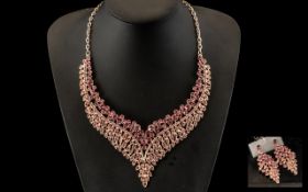 Dark Rose Pink Crystal Necklace and Matching Earrings Set, a statement necklace in a rose gold tone,