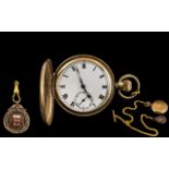 A Full Hunter Pocket Watch, white enamel dial, Roman numerals with subsidiary seconds.