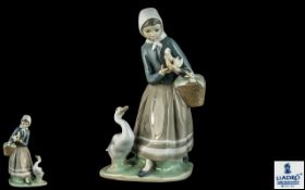 Lladro Hand Painted Porcelain Figure ' Shepherdess with Ducks ' Model No 4568. Issued 1969 - 1993.