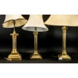 Two Mid 20thC Gilt Brass Corinthian Column Table Lamps. Of good quality. Together with one other.