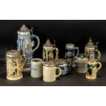 Collection of 10 German Stein Tankards, comprising: tall 15" tankard in glazed blue,