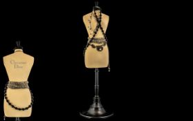 Christian Dior Jeweller Display Figurine raised on wooden pedestal,