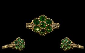 Ladies - Pretty 9ct Gold Emerald Set Cluster Ring of Flower head Design. Fully Hallmarked for 9.375.