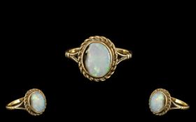 9ct Gold Opal Set Ring of Pleasing Design, Opal has Small Chip to Side, the Ring Is Fully Hallmarked