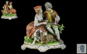 Unter-Weiss-Bach Hand Painted Porcelain Figure ' Young Romantic Couple ' Seated on a Grass Verge,