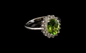 Peridot Halo Ring, an oval cut rich spring green, sparkling peridot of 2cts, framed by .