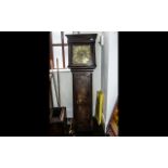 An Antique Grandfather Clock with a thirty hour brass square dial engraved with makers name Joseph