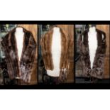 Three Vintage Fur Collars comprising a Mink collar with tails in golden brown,
