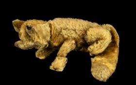 Early 20th Century Straw Stuffed Toy Fox, in golden colour fur, moving head and front legs.