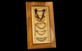 Vintage Gucci Jeweller's Display Frame with gold lettering Gucci to top,