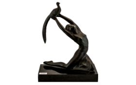 Art Deco Style Bronzed Figure Dancing Maiden Holding Aloft A Pheasant, Raised On A Marble base,