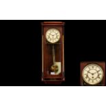 Mahogany Cased Key Wind Wall Clock. Westminster Chime.