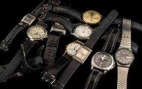 Large Faced Fashion Designer Dress Watches with Black Leather Straps. ( 10 ) In Total.