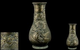 A Late 19th Century Chinese Bronze Cast Dragon Vase of a Teardrop Shape Body A/F. 16" high.