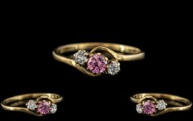 9ct Gold Twist Dress Ring. Pink Centre Stone Flanked by 2 White Stones Either Side.