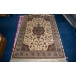 A Cashmere Gold Ground Unique Medallion Design Rug measuring 1.70 by 1.20 m. As new condition.