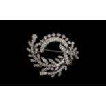 14ct White Gold Superb Quality and Attractive Baguette and Brilliant Cut Diamond Brooch. c.1960's.