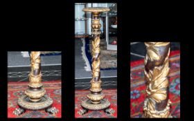 Gilt Lacquered Torchere carved column of Italian style, stepped circular base on three paw feet.