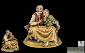 Capodimonte - Signed and Fine Hand Painted Sculpture / Porcelain of An Elderly Couple.