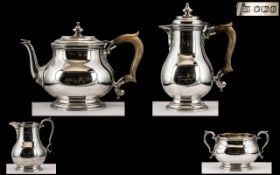 A Superior Quality - Heavy ( 4 ) Piece Sterling Silver Tea Service of Excellent Design and Form.