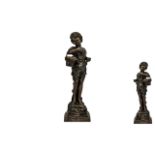Reproduction Bronze of a Girl Carrying a Basket of Fruit, measures 24" high.