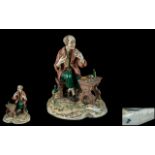 Capodimonte Signed and Early Hand Painted Porcelain Figure ' The Clock Maker ' Signed H. Schober. c.