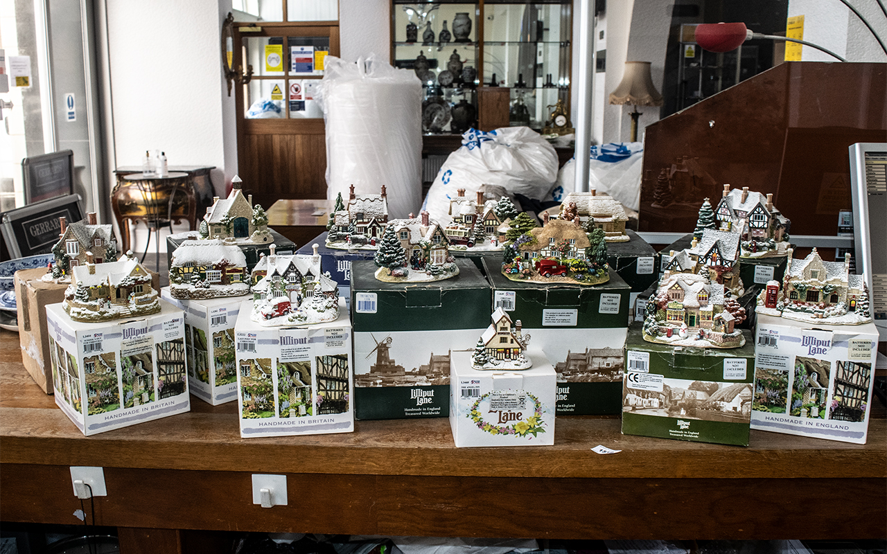 Collection of Lilliput Lane Light Up Christmas Cottages,