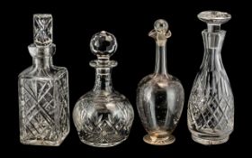 Collection of Four Cut Glass Decanters,